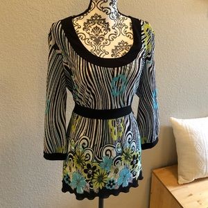 Beautiful pleated top with floral pattern